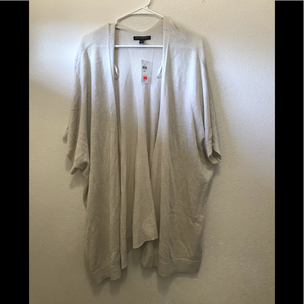 Brand new, never used Tan/Cream colored Caftan style cardigan.